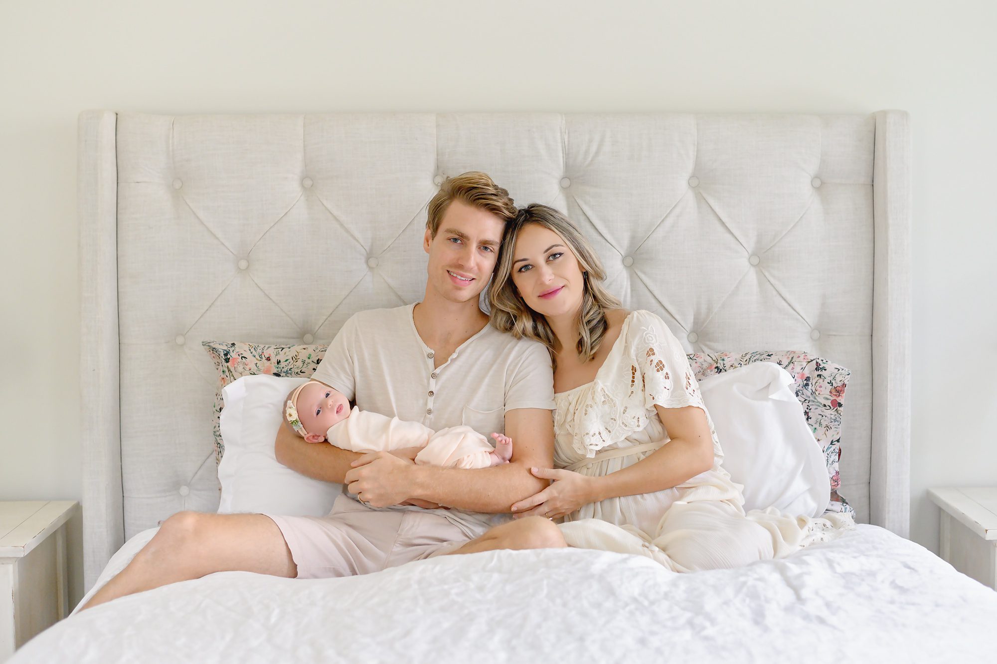 A young couple who just welcomed their first child gets photographed in their new home in Riverside Heights, Florida that they designed themselves in a french cottage design. 