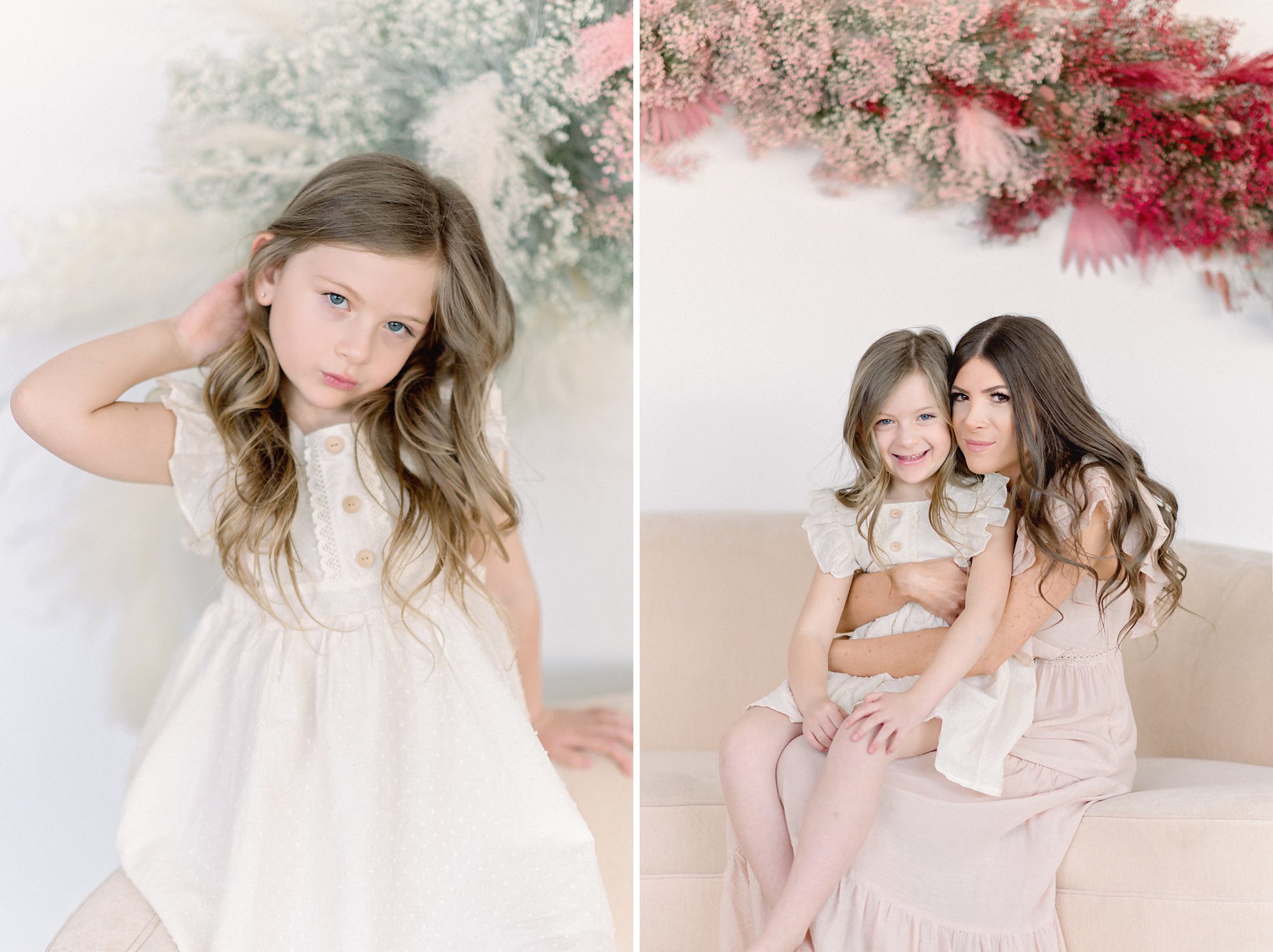 A 6 yr old girl and her mom get photos taken around Valentine's Day in a bright white studio in Denver, CO with a beautiful pink floral backdrop.